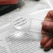 Pince à fiches avec loupe, loupe publicitaire